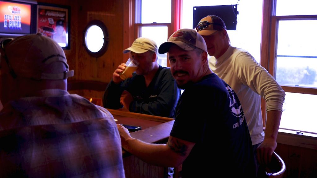 Photographer Alex Landeen enjoying an apres'-fishing beverage. 